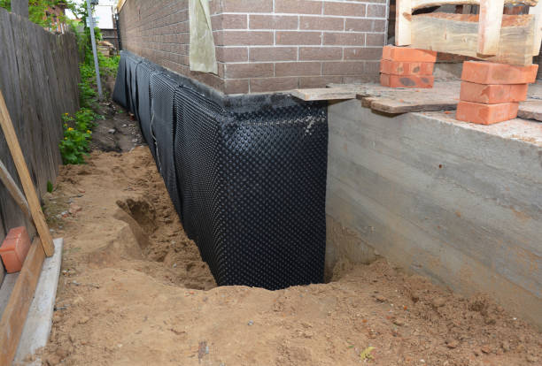 SJ Waterproofing Pros technician performing targeted Sump Pump Installation assessment in Paris, VA